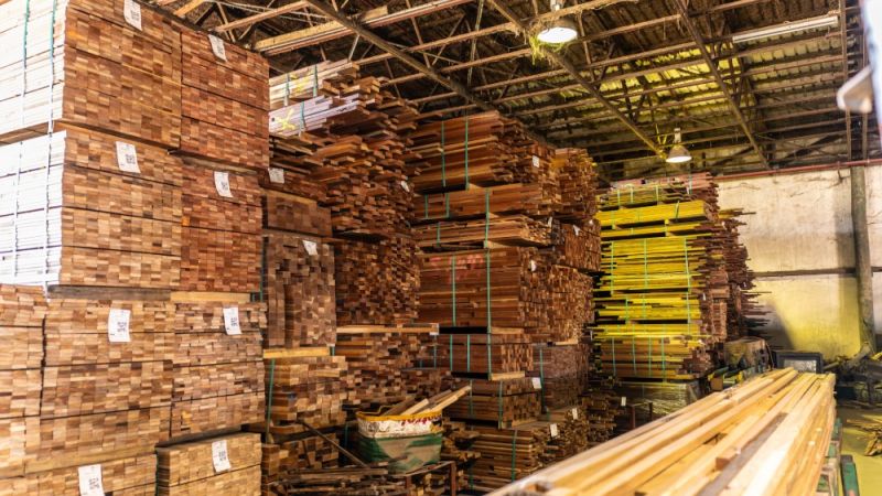 Timber piled up in a mill.