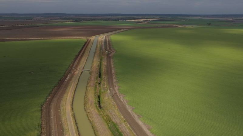 Aerial shot of green irrigated landscape and water in north west Queensland.